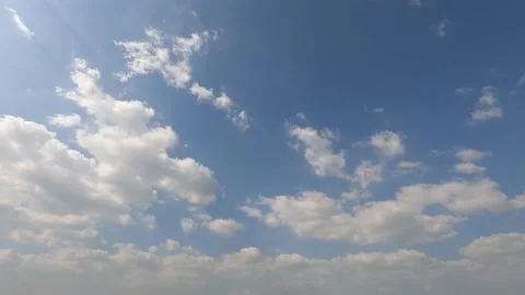 White clouds cumulus floating in the blue sky Stock Footage 168659008