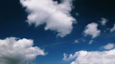 White clouds on dark blue sky time lapse t3373C Stock Footage 11526231