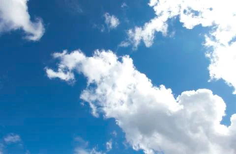 White clouds in a dark blue sky in Europe Stock-Fotos