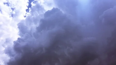 White clouds disappear in the hot sun on blue sky. Time-lapse motion clouds blue Stock Footage 76775060