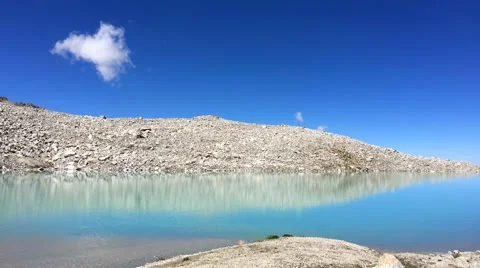 White clouds disappear over the lake Stock Footage 67247403