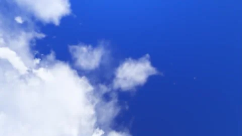 White Clouds Drifting Across a Clear Deep Blue Sky Stock Footage 330919289
