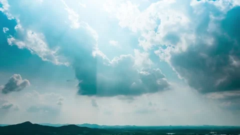 White Clouds Drifting Over Vast Natural Landscape under blue sky Stock Footage 347038663