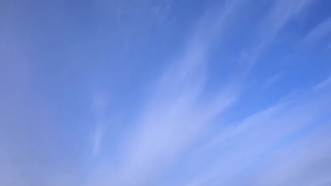 White clouds float across the blue sky. Timelapse Stock-Footage 335082113