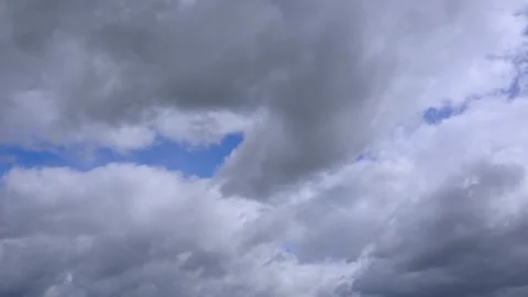 White clouds float across the blue sky. Timelapse Stock-Footage 335302948