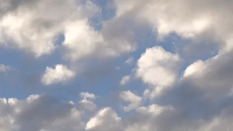 White clouds float in the blue sky Video stock 281667488