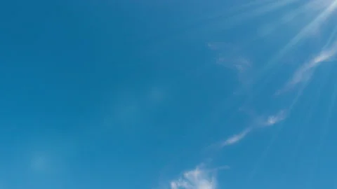 White Clouds Floating Across the Blue Sky Covered by Parachutes: Entertainment Stock Footage 276235301
