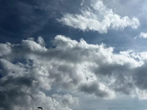 White Clouds Floating in Blue Sky Stock Photos