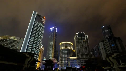 White clouds floating over buildings at night in Chongqing Stock-Footage 146669452