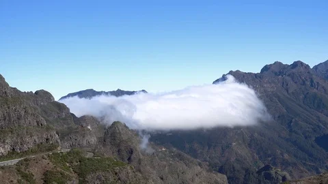 White Clouds Flow in Mountain Stock Footage 72861498