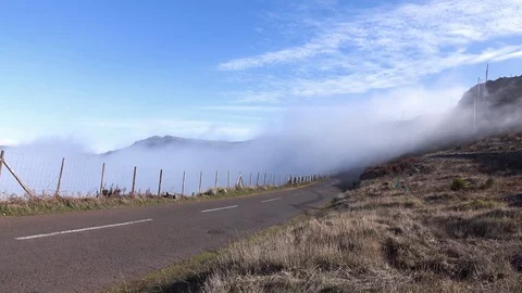 White Clouds Flow in Mountain Stock Footage 72861601