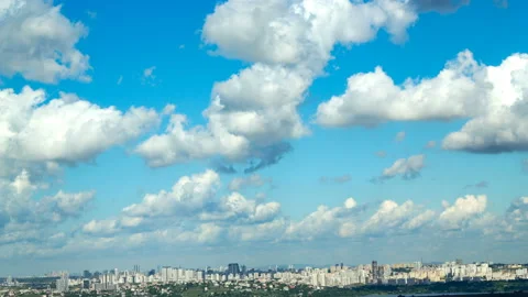 White clouds flowing in blue sky on sunny summer day Stock Footage 130881496