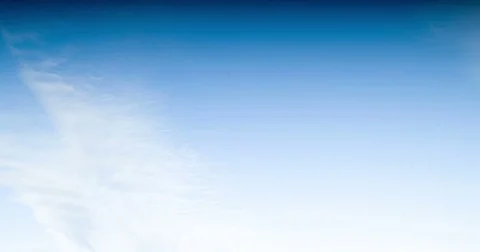 White clouds fly across the blue sky Stock Footage 79383830