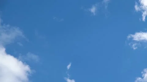 White clouds fly across the blue sky. Delicate clouds in the sky Video stock 196696785