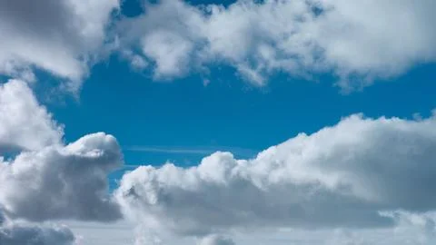 A white clouds fly in the blue sky 스톡 사진