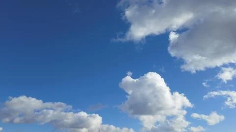 A White clouds fly in the sky Stock Photos