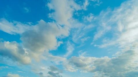 White clouds flying on blue sky. Time lapse Stock Footage 74908967