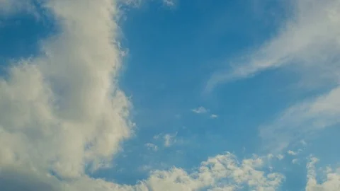 White clouds flying on blue sky. Time lapse Stock Footage 74909805