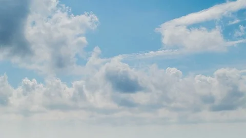 White clouds flying on blue sky. Timelapse Stock Footage 82536825