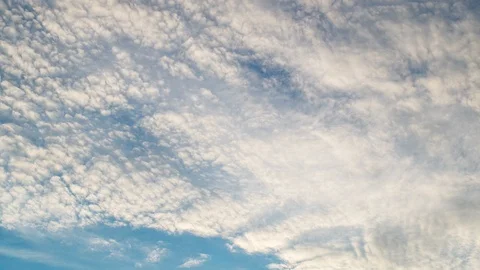 White clouds flying on blue sky. Timelapse Stock Footage 85633907