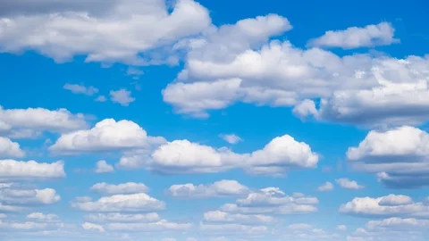 White clouds flying on blue sky. Timelapse Stock Footage 129341257