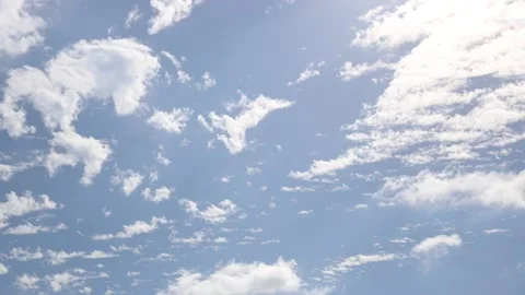 White Clouds Flying On Blue Sky Stock Footage 142070004