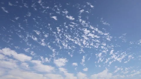 White Clouds Flying On Blue Sky Stock Footage 142070042