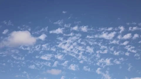 White Clouds Flying On Blue Sky Stock Footage 142070089