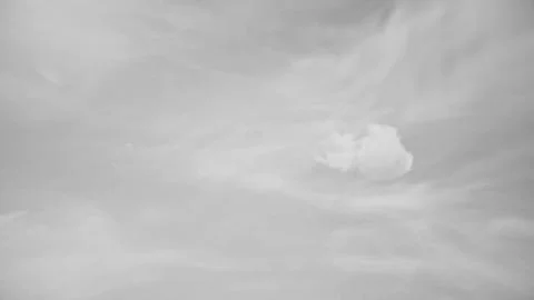 White clouds flying blue sky time lapse. Dark storm clouds are moving fast at Stock Illustration