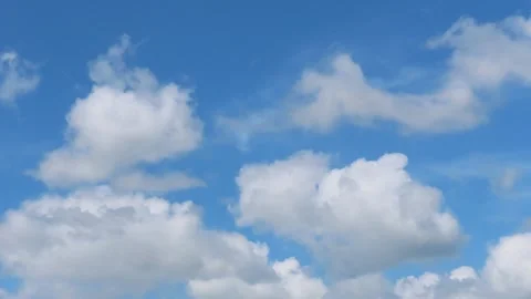 White Clouds Flying,Blue sky time-lapse, Stock Footage 257908957