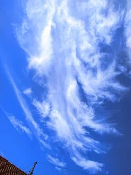White clouds form a fire-like pattern Stock Photos