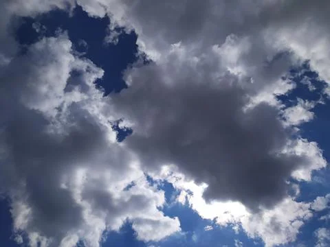 White clouds high in the sky at Stock Photos