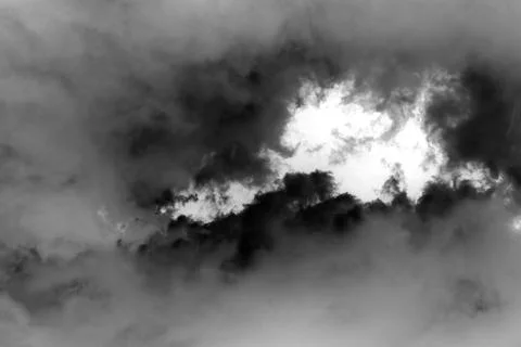 White clouds isolated on black sky background...Black sky and white clouds... Stock Photos