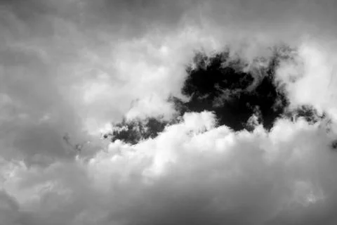 White clouds isolated on black sky background...Black sky and white clouds... Stock Photos