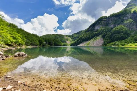 White clouds on the lake Stock Photos