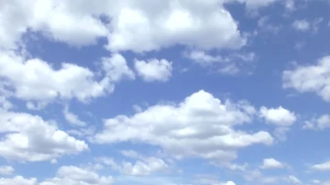 White clouds in motion against a blue sky Stock Footage 130543442