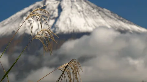 The white clouds on the mount Fuji in Japan with the snowy tip Stock Footage 155013819