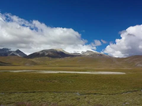 The white clouds on the mountain in Tibet Stock Photos