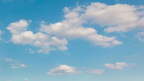White clouds move across the blue sky, sunny day, summer season Stock Footage 86689881
