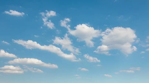 White clouds move across the blue sky. Sunny day, summer time Stock Footage 86695488