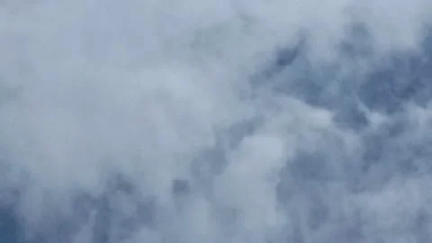 White clouds move like cotton dots in the blue sky Stock Footage 221013352