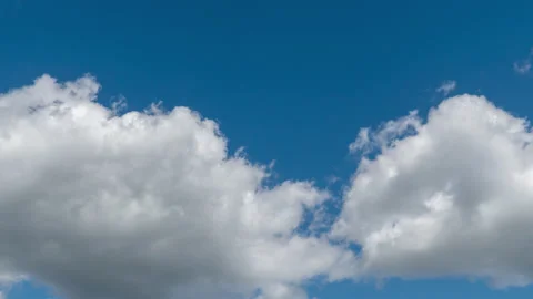 White clouds move fast in the blue sky Stock Footage 130456890