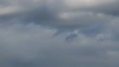 White clouds move fast in the blue sky. Timelapse Stock Footage 130902092