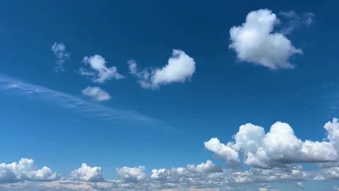 White clouds moving across beautiful blue sky Stock Footage 330152755