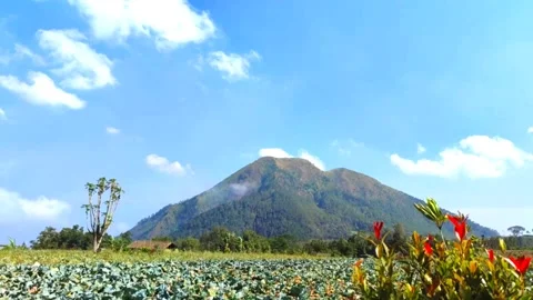 White clouds moving around the beautiful mountains Stock Footage 252555542