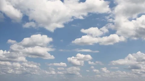 White clouds moving in blue sky Stock Footage 7746446