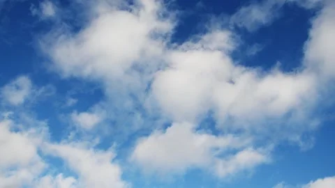 White clouds moving in the blue sky. Stock Footage 247075708