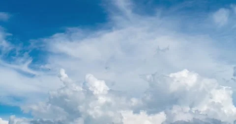White clouds moving dynamic time lapse footage 4K Stock Footage 254923573