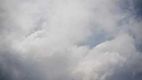 White clouds moving fast against the blue sky Stock Footage 211308986