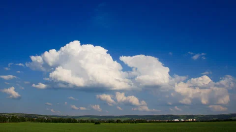White clouds moving fast over blue sky, time lapse. Stock Footage 37570101